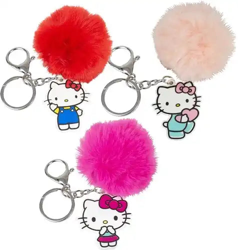 8721077563381 – Hello Kitty porte-clés pompon peluche 7cm + pendentif 6cm (colis 12 pièces assorties en display)