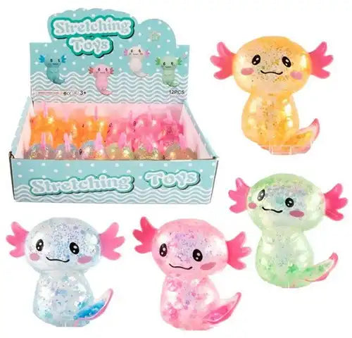 8720847744784 – Squeeze Axolotl Glitter 9 cm (3 assortis en présentoir, colis de 12 pcs) dispo Simcha.fr